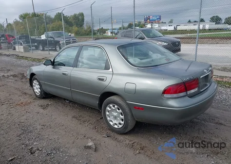 1997 Mazda 626 Dx/Lx from USA, damaged, VIN 1YVGE22C3V5631655